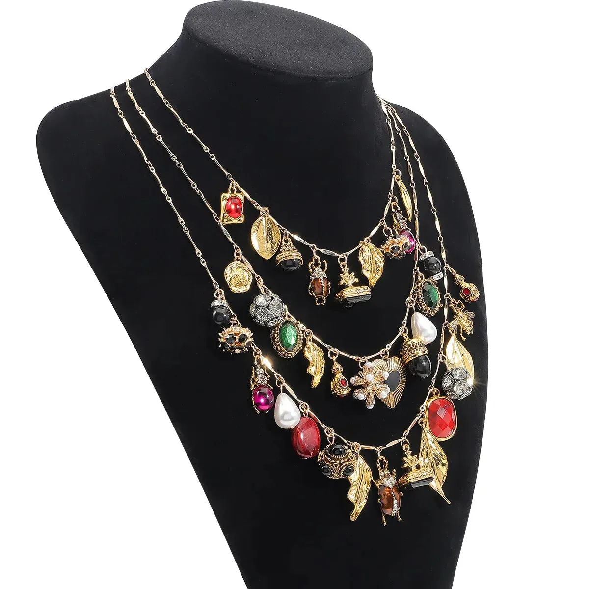 Charmed- the Triple Strand Chain Necklace With Charms