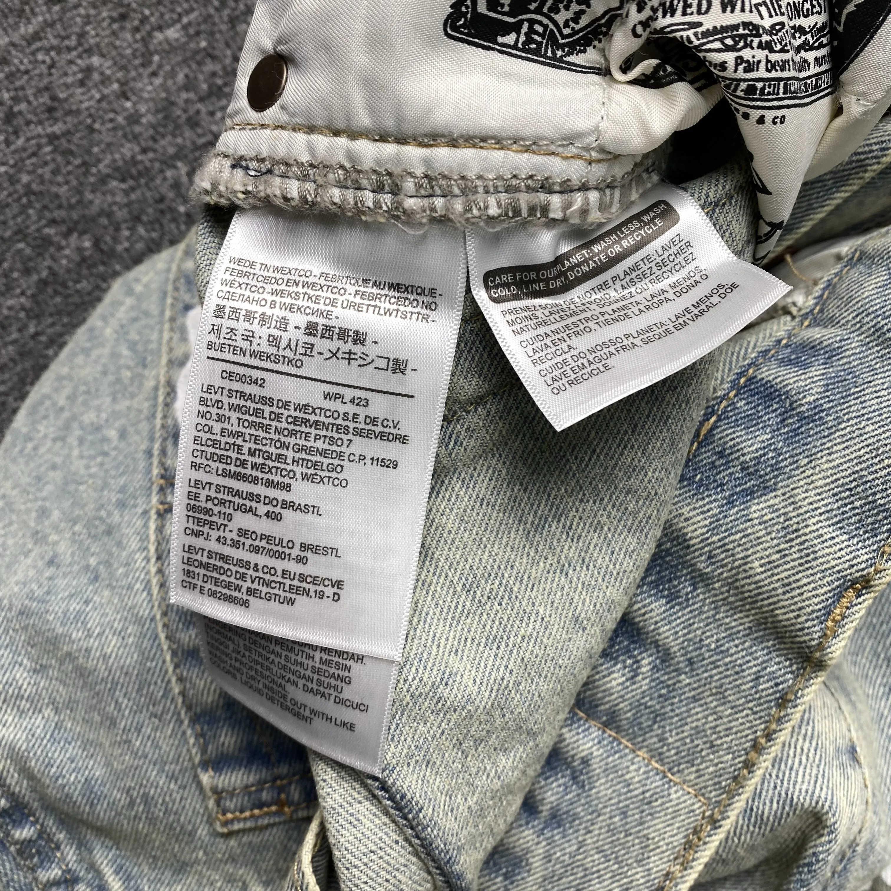 DENIM TEARS x LEVI'S DIRTY WASH WREATH JEANS LIGHT WASH